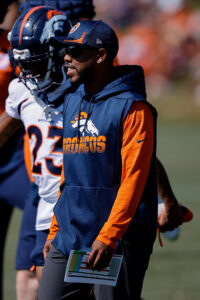 cowboys hire christian parker as dc