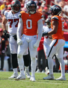 broncos’ jonathon cooper pleads not guilty to domestic violence charges